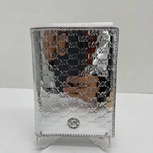 Michael Kors Handbags - Michael Kors Jet Set Travel Md Sign Patent Logo Debossed  Passport Case
Silver